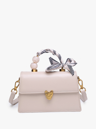 Light beige Venice Vegan Pearl crossbody with black-and-white bow and faux pearls