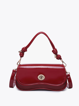 Osaka vegan crossbody cherry red with braided handle, round logo medallion, and strap