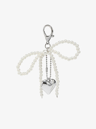 Beaded white bead charm with heart pendant and hanging tassels