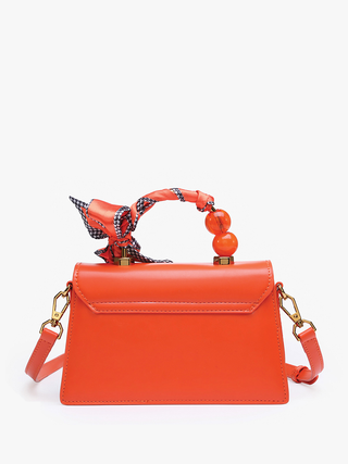 Orange Venice Vegan Pearl crossbody bag with bow top and beaded accent handle