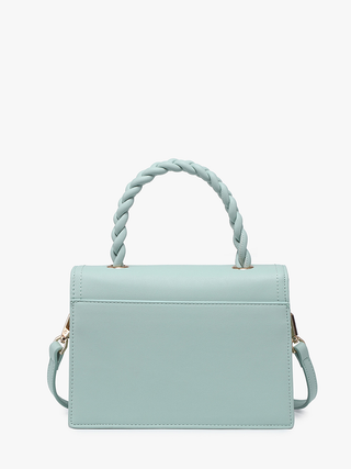Light blue vegan crossbody bag with braided top handle and flap front, side strap visible