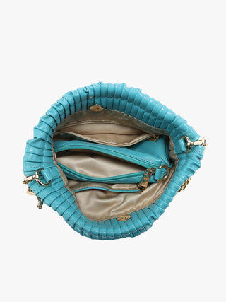 Aqua pleated bucket bag interior with zip pocket and braided gold hardware