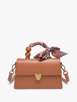 Venice Vegan Pearl crossbody in light brown with patterned bow and faux pearl handle