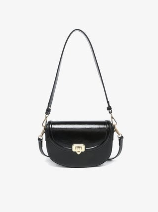 Bristol vegan crossbody in black, glossy curved flap with metal clasp and chain straps