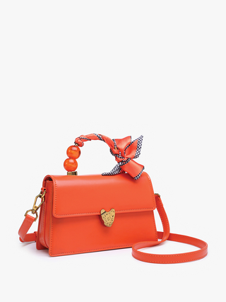 Venice Vegan Pearl crossbody in orange with bow detail and beaded handle