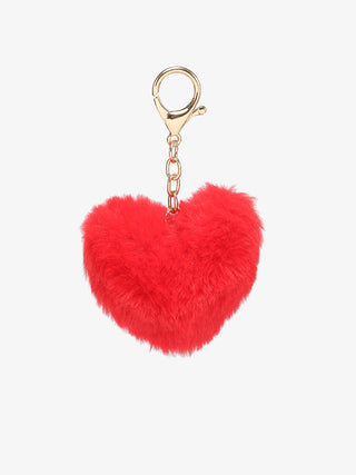 Fur bag charm with red heart-shaped fuzzy pom-pom and gold-tone clasp chain