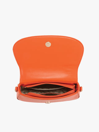 Orange vegan crossbody bag with snap closure and open top view of interior.