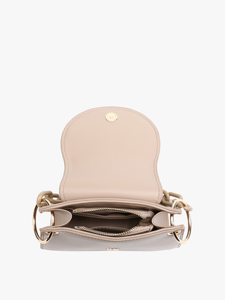 Beige satchel open view with front flap and two compartments, chain straps attached