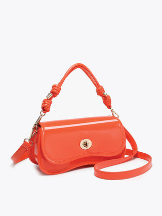 Osaka vegan crossbody bright orange; flap with round logo medallion and adjustable strap