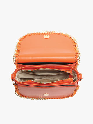 Orange crossbody bag open view: flap, fabric lining and chain trim edge