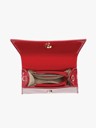 Wine crossbody bag open view, top clasp closure, gold hardware, interior pockets