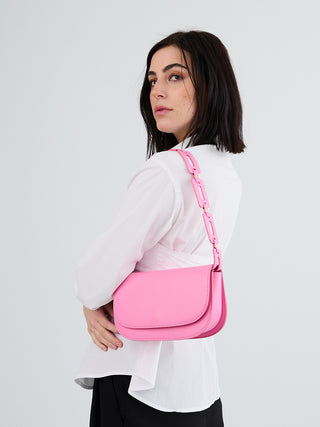 Tripoli vegan shoulder bag, bubblegum pink, worn crossbody with chain link strap