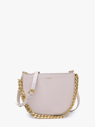 Vegan chain saddle bag, light beige front view with gold chain strap and curved flap