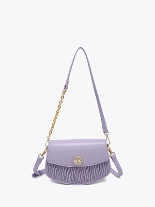 Periwinkle textured vegan crossbody with gold chain strap and front flap clasp
