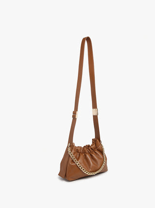 Ruched vegan bucket bag in brown with long shoulder strap and gold chain trim