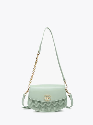 Pale sage textured vegan crossbody with gold chain strap and front flap clasp