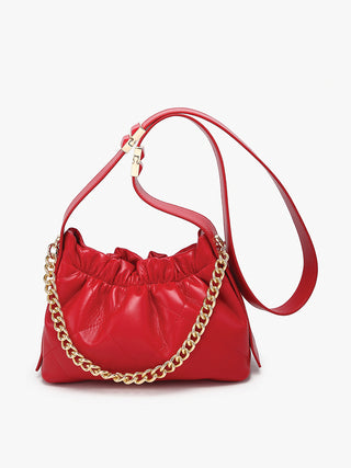 Ruched vegan bucket bag in red with gold chain strap and ruched drawstring top