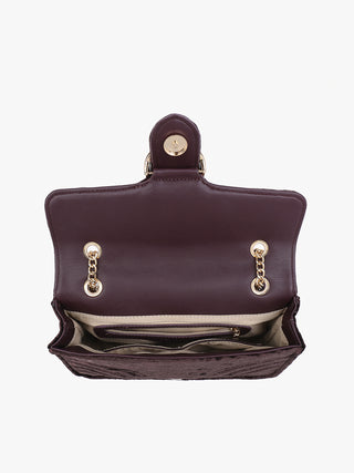 Velvet crossbody bag interior view with ring clasp and top flap