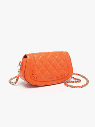 Orange quilted vegan crossbody bag with chain strap and front flap closure.