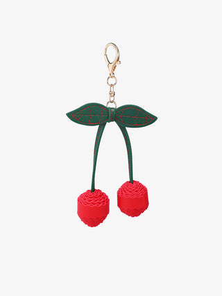 Fruit bag charm with dark green leaf bow and red cherry pom-pom dangles