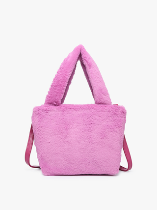Purple fuzzy satchel front view with short handles and side straps