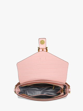 Pink vegan shoulder bag with textured finish, open top view, zip pocket inside.