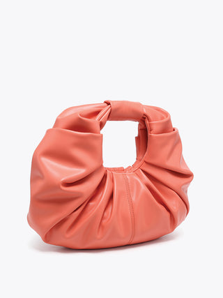 Peach ruched satchel with ring handle, soft puckering and stitched center seam